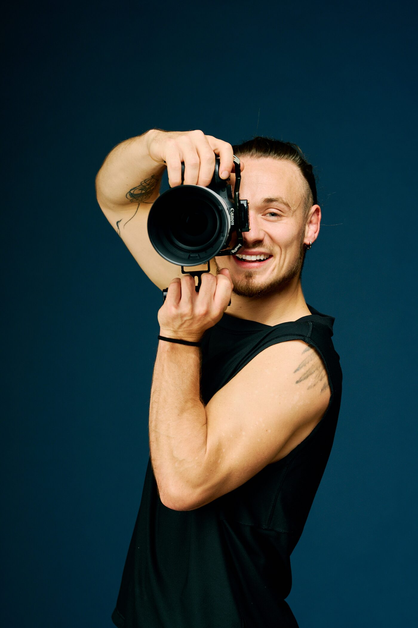 Studio Kreuzkölln Team: Fotograf mit Kamera